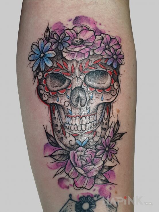 Tattoo Kolorowa czaszka in santa muerte motif and graphic / illustrative style On the arm