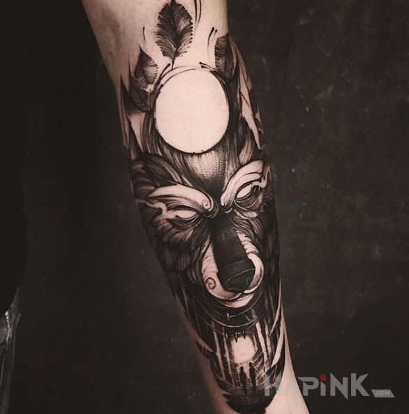 Tattoo Duchowy przewodnik in black and gray motif and graphic / illustrative style On the arm
