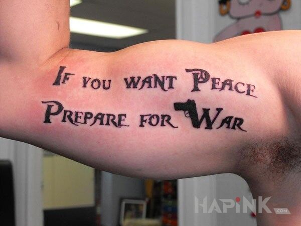 Tattoo If you wan't peace prepare for war in lettering motif on the upper arm