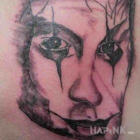 Tattoo Terrible fall on the shoulder blades motif: characters