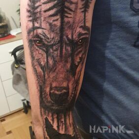 Tattoo Wolf On the arm motif: animals style: graphic / illustrative