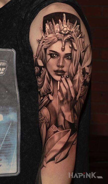 Tattoo Piękna dama w koronie in black and gray motif and realistic style On the arm