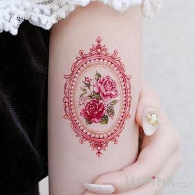 Tattoo Two roses in a frame On the arm motif: floral style: realistic