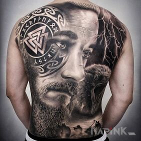 Tattoo Viking face on the back motif: faces style: realistic