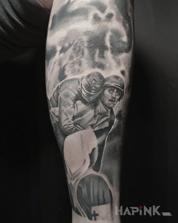 Tattoo Żołnierze in black and gray motif and realistic style on the forearm