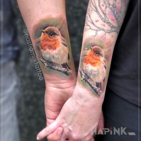 Tattoo Birds on the forearm motif: Love style: realistic
