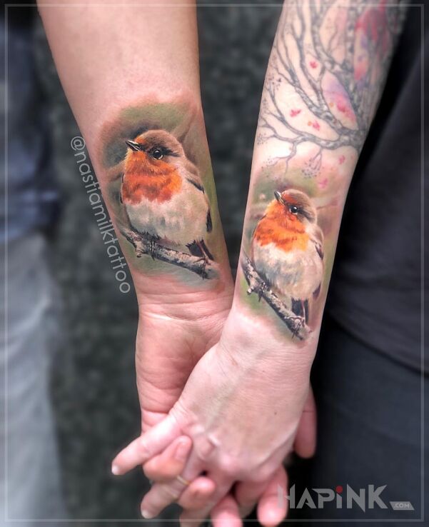 Tattoo Ptaki in Love motif and realistic style On the arm