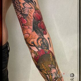 Tattoo Attack on the forearm motif: flowers style: neo-traditional