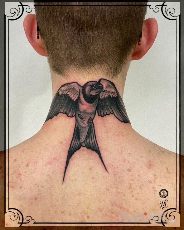 Tattoo Jaskółka in black and gray motif and graphic / illustrative style on the nape