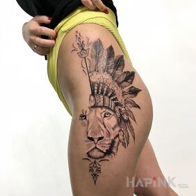 Tattoo Lion on the thigh motif: black and gray style: graphic / illustrative
