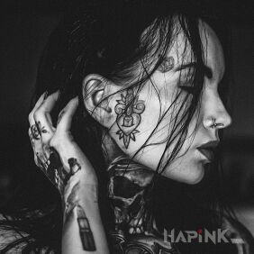 Tattoo Dagger in the heart on the face motif: black and gray style: graphic / illustrative