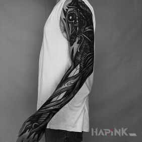 Tattoo Black horse on the forearm motif: black and gray style: blackwork / blackout