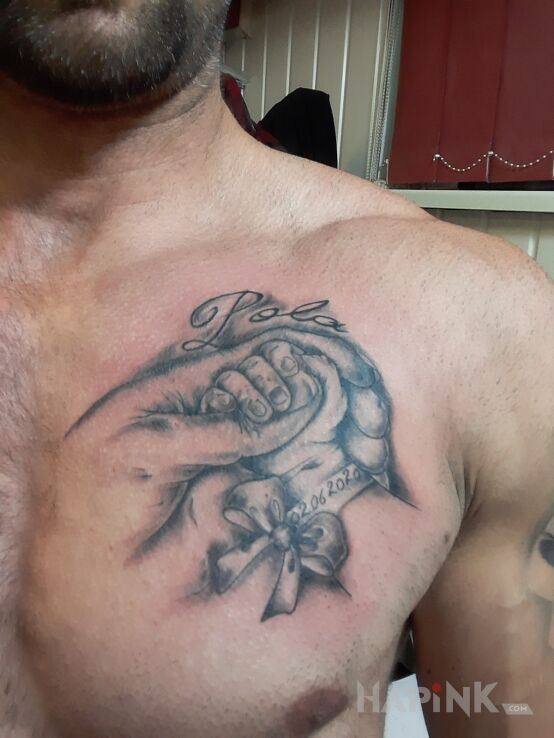 Tattoo Z okazji narodzin dziecka in other motif and realistic style on the chest