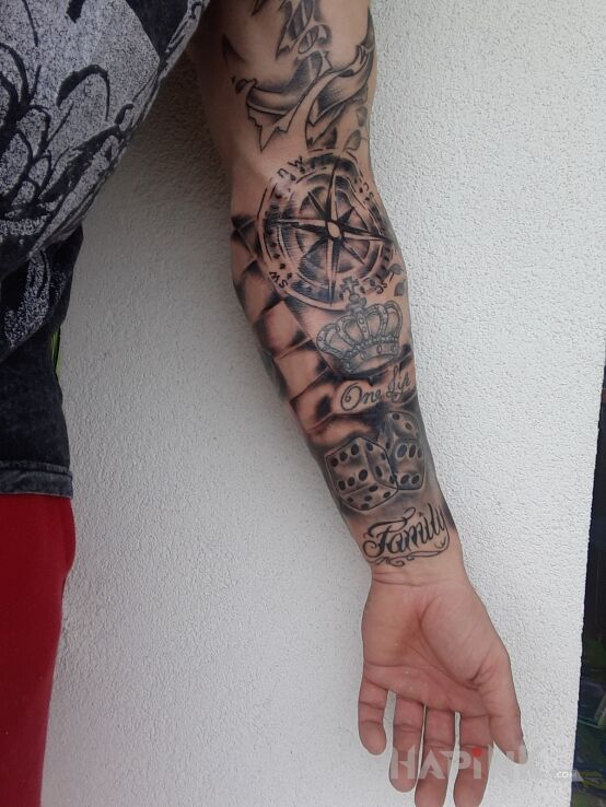 Tattoo Rękaw in black and gray motif and realistic style on the bicep
