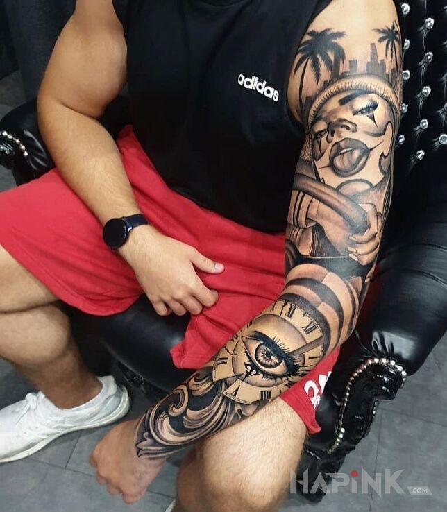 Tattoo Dziewczyna pod palmami in faces motif and realistic style On the arm