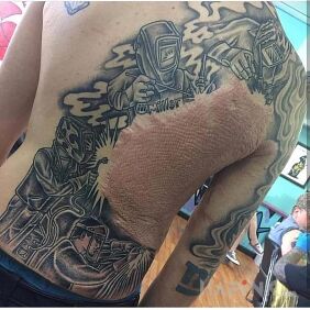 Tattoo Awesome tattoo idea on the back motif: black and gray style: graphic / illustrative