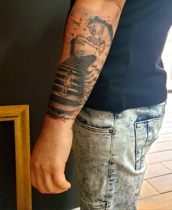 Tattoo Nie ten czas... in black and gray motif and graphic / illustrative style On the arm