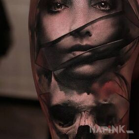 Tattoo Portrait of a woman and a skull on the upper arm motif: characters style: realistic