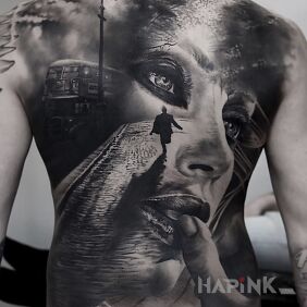 Tattoo Huge female face on the back motif: faces style: realistic