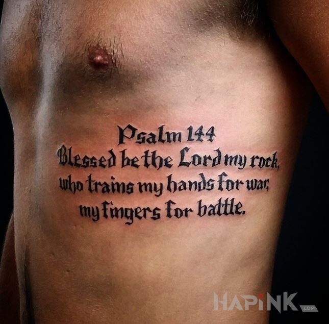 Tattoo Psalm 144 in lettering motif and calligraphy style on the ribs