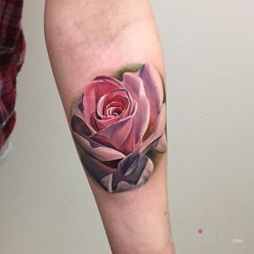 Tattoo The perfect flower for women on the forearm motif: flowers style: realistic