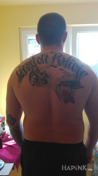 Tattoo Jp I wszystko jasne :-) in lettering motif on the back