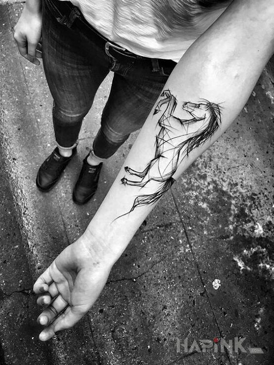Tattoo Koń ze szkicownika in black and gray motif and sketch style on the forearm
