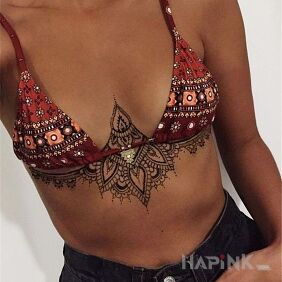 Tattoo Patterns along the breast line on the stomach motif: ornaments style: graphic / illustrative