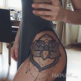 Tattoo On the side a lotus flower on the thigh motif: ornaments style: graphic / illustrative