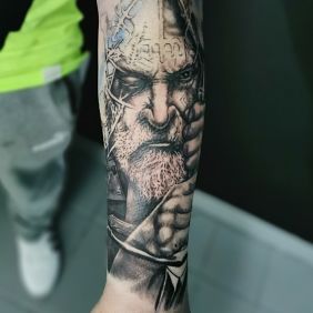 Tattoo In progress On the arm motif: black and gray style: realistic