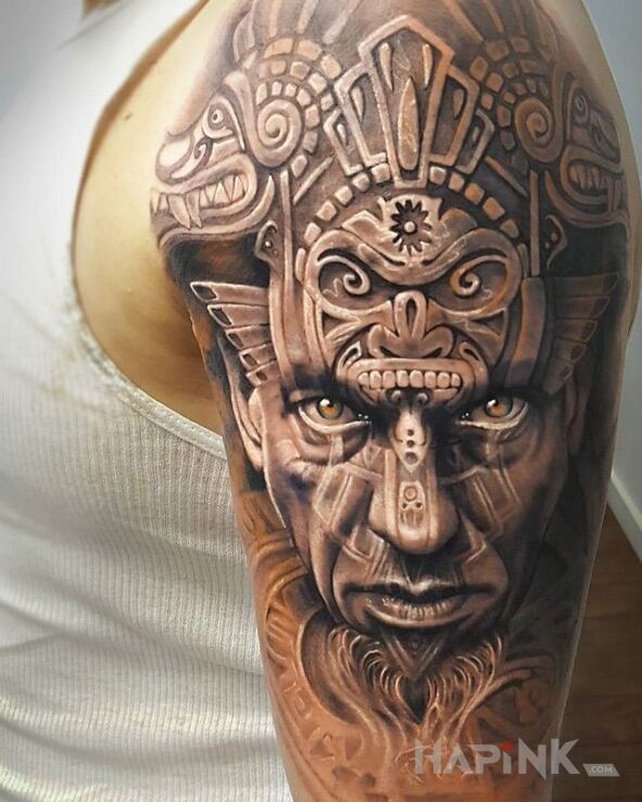 Tattoo Aztek in 3D motif and realistic style on the upper arm
