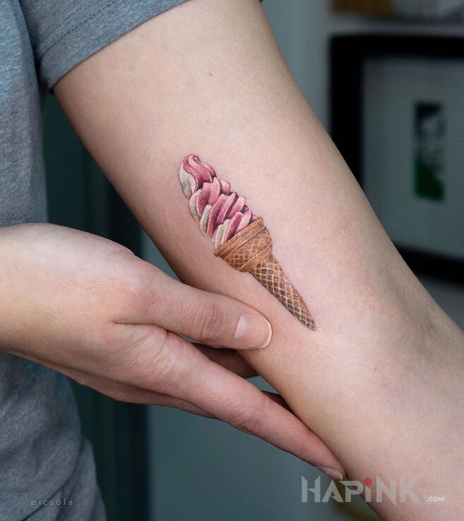 Tattoo Ice cream in colorful motif and minimalistic style on the bicep