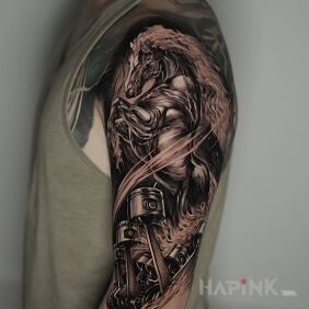Tattoo Mechanical horse ? on the upper arm motif: black and gray style: realistic