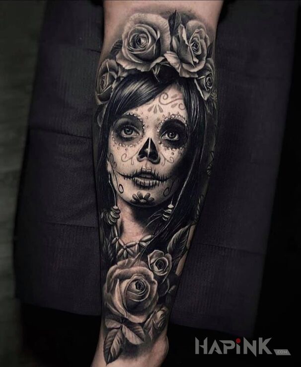 Tattoo Święta śmierć in santa muerte motif and realistic style On the arm