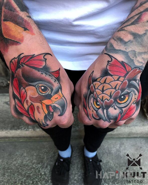 Tattoo PTAKI in colorful motif and neo-traditional style on the hand