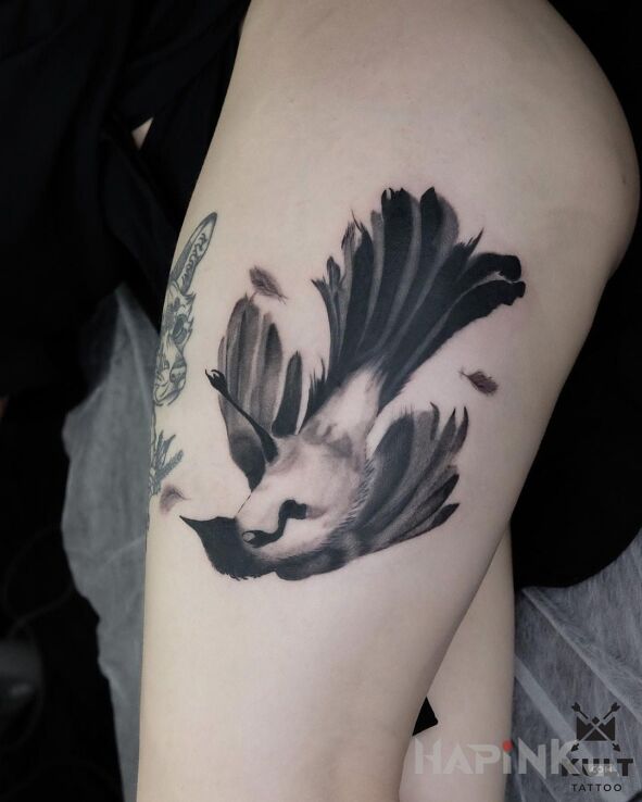 Tattoo PTAK in animals motif and graphic / illustrative style on the leg