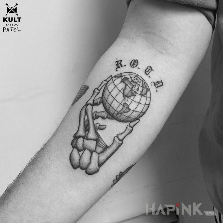 Tattoo SZKIELET in cosmos motif and graphic / illustrative style On the arm