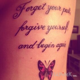 Tattoo Inscription and butterfly on the ribs motif: lettering