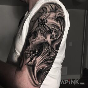 Tattoo Clock in a skull on the upper arm motif: black and gray style: realistic