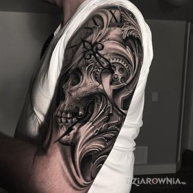 Tatuaż Zegar w czaszce na ramieniu motyw: 3D styl: realistyczne