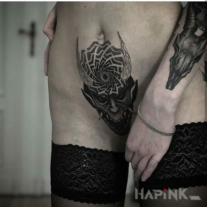 Tattoo Czort in skulls motif and graphic / illustrative style on the stomach