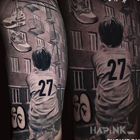Tattoo Immortalizing the love for a childhood passion on the upper arm motif: black and gray style: realistic