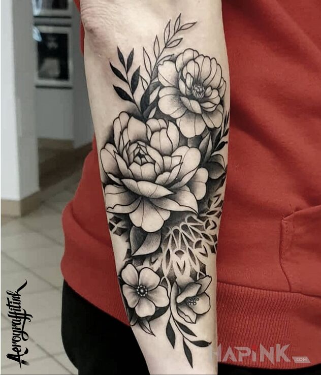 Tattoo Wisenne motywy in floral motif and graphic / illustrative style On the arm