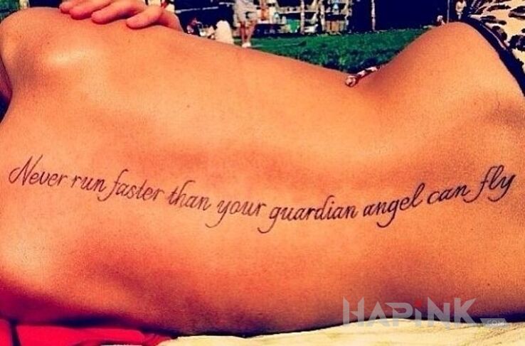 Tattoo Anioł Stróż in lettering motif and calligraphy style on the back