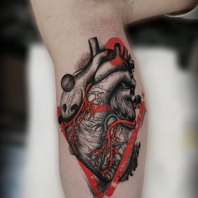 Tattoo Heart On the arm motif: black and gray style: graphic / illustrative