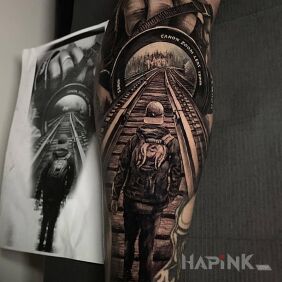 Tattoo Camera tunnel On the arm motif: black and gray style: realistic