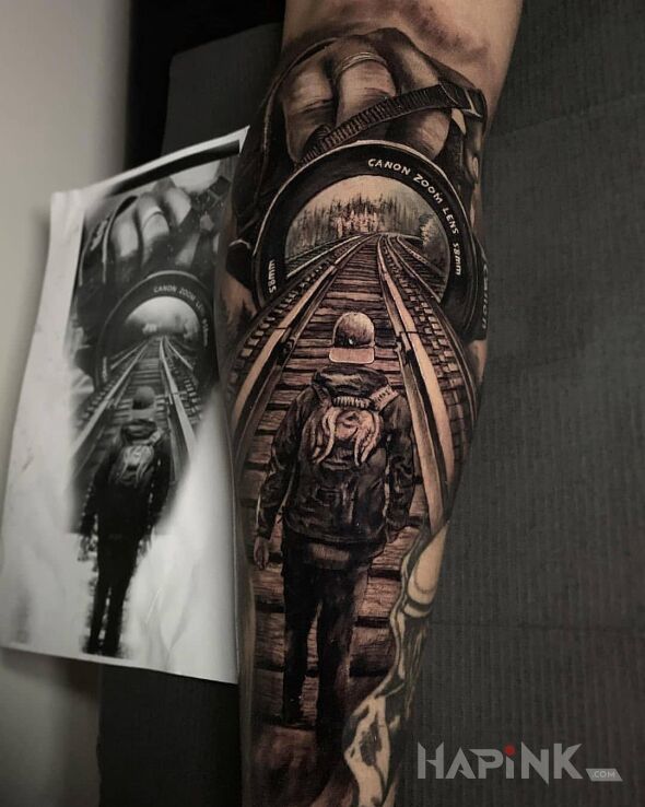 Tattoo Tunel aparatu in black and gray motif and realistic style on the forearm