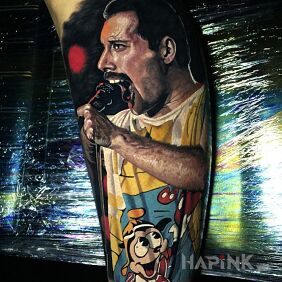 Tattoo Queen singer on the forearm motif: characters style: realistic