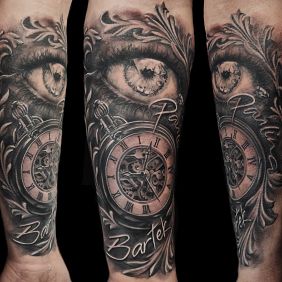 Tattoo Clock eye On the arm motif: objects style: realistic