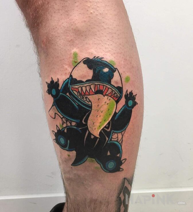 Tattoo StichVenom in characters motif and graphic / illustrative style on the leg